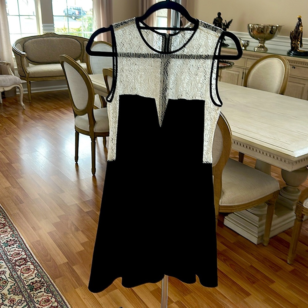 Looks beautiful when worn. Much more so than on the hanger.